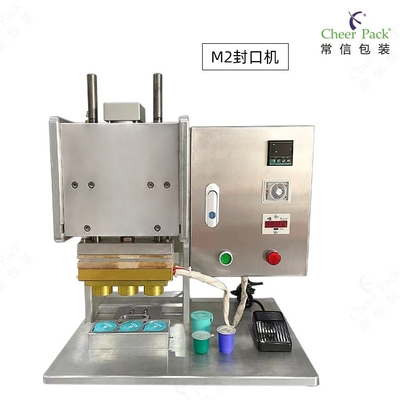 ماشین کوچک نیمه اتوماتیک مهر و موم گرما برای کیسه های ایستاده و فنجان های کپسول